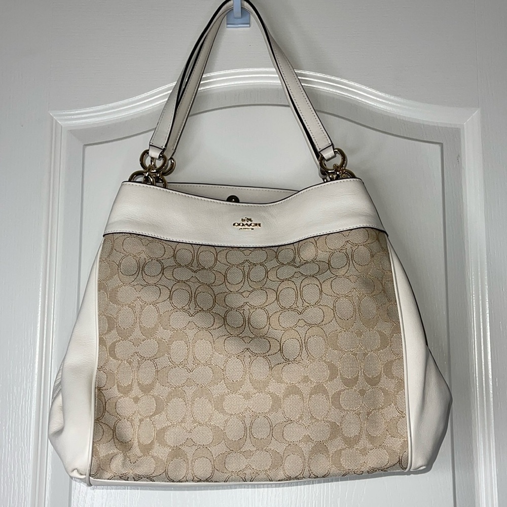 Coach leather and traditional C print cloth bag in new without tags condition